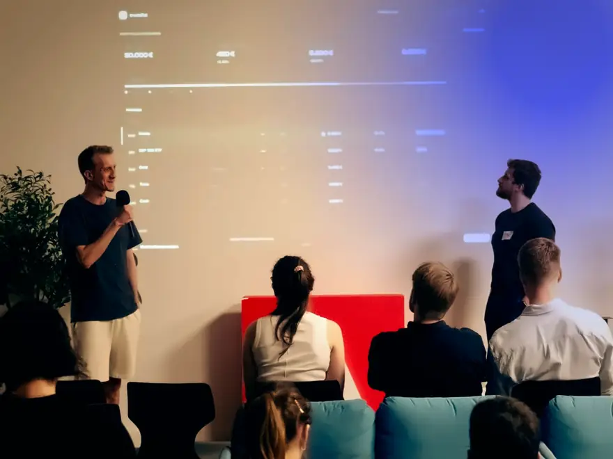 Murat presenting TradePal at the Cursor Hackathon in Berlin